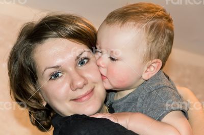 Kissing son with mother