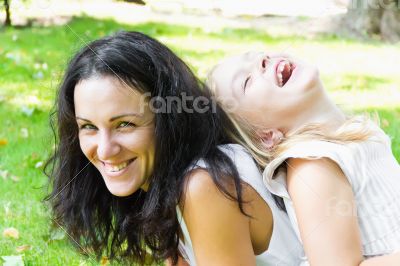 Laugh of mother and daughter