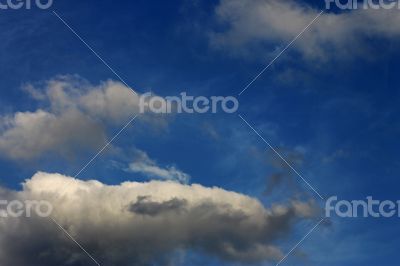 Blue sky and white clouds and the sun