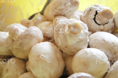 Champignon mushrooms in marinade ready for cooking