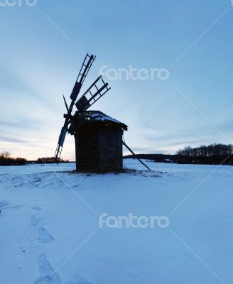 Old wooden windmills at Pirogovo ethnographic museum, Ukraine 