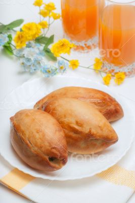 Three appetizing pie and orange juice