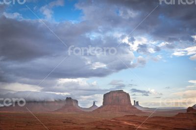 big cloud on mesa in Monument valley