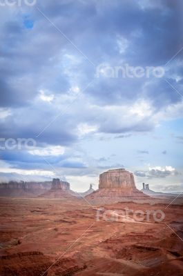 big cloud horizontal on mesa in Monument valley