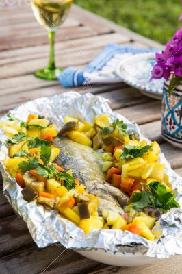 Baked sea bass with vegetables