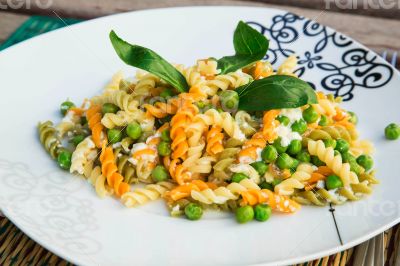 Italian pasta with ricotta cheese,olive oil, and fresh green pea