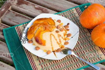 Semolina with baked slices of pumpkin,raisins and almond