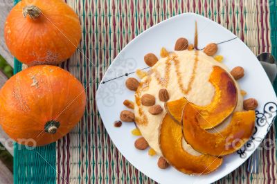 Semolina with baked slices of pumpkin,raisins and almond