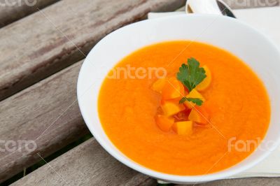 A plate of carrot soup A plate of carrot soup