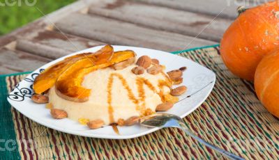 Semolina with baked slices of pumpkin,raisins and almond