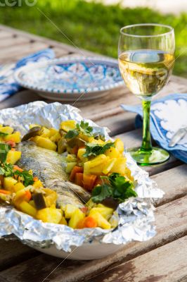 Baked sea bass with vegetables