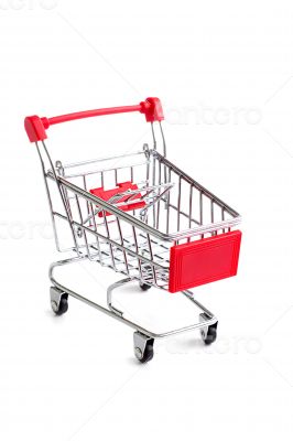 Small red shopping cart isolated
