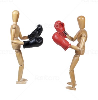 Two People Sparring with Boxing Gloves