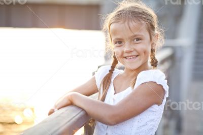 Happy young girl in a city