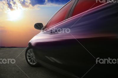 moving car against sunset