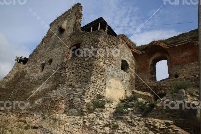 Ancient ruins against blue sky at sunny day