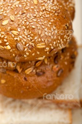organic bread over rustic table organic bread over rustic table