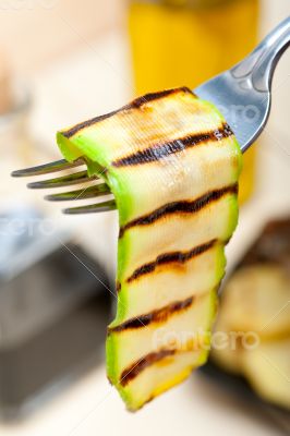 grilled zucchini courgette on a fork grilled zucchini courgette on a fork
