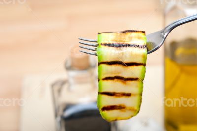 grilled zucchini courgette on a fork grilled zucchini courgette on a fork