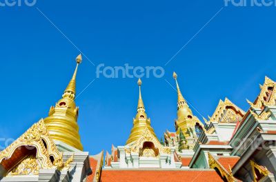 Golden pinnacle of thai temple