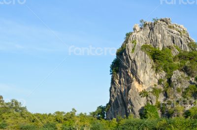 Stone mountains and forests on sky Stone mountains and forests on sky