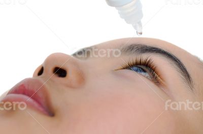 Caring for eyes with eye drops.