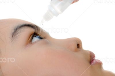 Caring for eyes with eye drops.