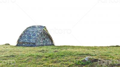 Tent camping at grass on the hill in morning.