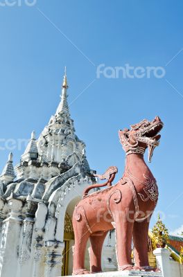 Red Lion statue at Wat Phra That Hariphunchai 