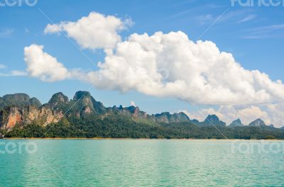 High mountain range above the green lake