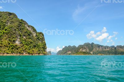 High mountain range above the green lake