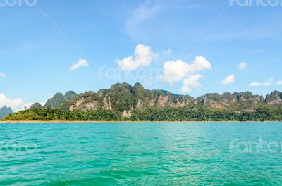 High mountain range above the green lake