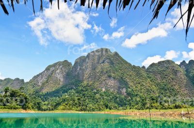 High mountain range above the green lake