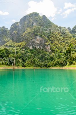 High mountain range above the green lake