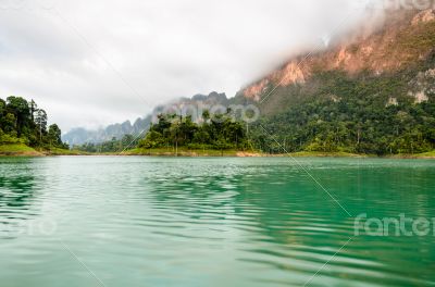 Beautiful high mountains and green lake