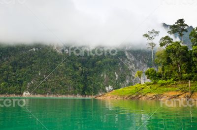 Beautiful high mountains and green lake