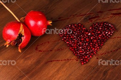 Two Pomegranate and heart composition