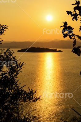 High angle view beautiful lake and island at sunset