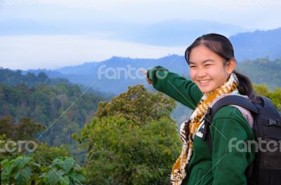 Tourist girl on the mountain