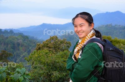 Tourist girl on the mountain