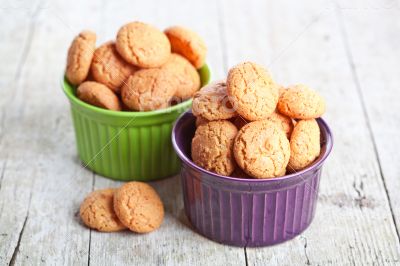 meringue almond cookies in bowls 