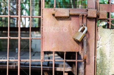 Steel cage door was locked with a key