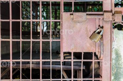 Steel cage door was locked with a key