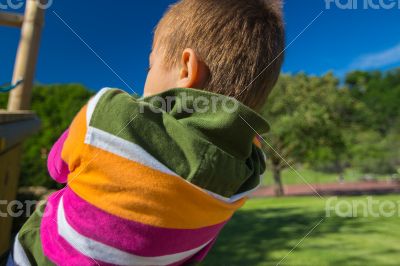 young boy climbing