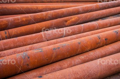 Rusty metal pipes stack