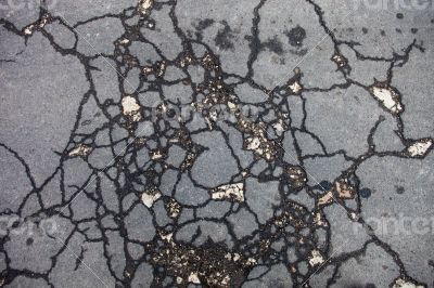 Cracked asphalt surface