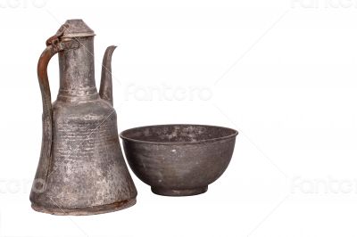 Antique copper jug on the white background