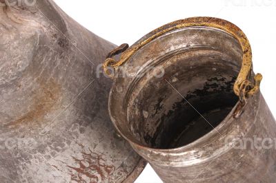 Antique copper jug on the white background