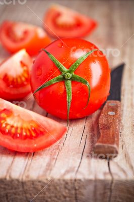 fresh tomatoes and knife