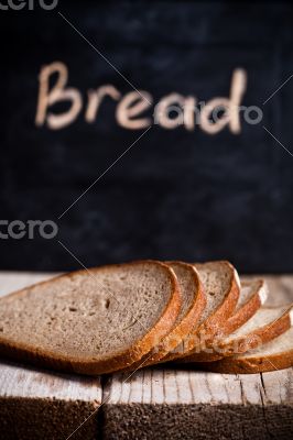 slices of rye bread and blackboard 
